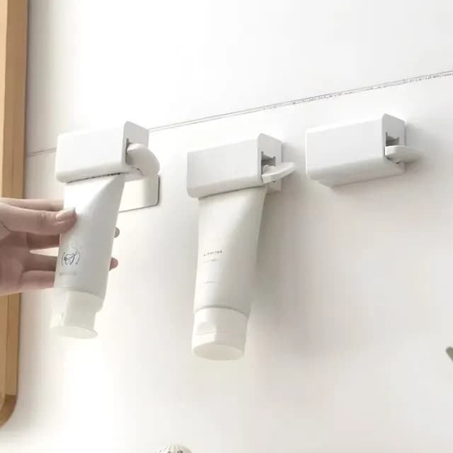 【聰明家】便捷磁吸壁掛旋轉軟管擠壓器-2入組(免釘 擠牙膏器 無痕按壓夾 洗面乳 保養品護手霜 置物架)