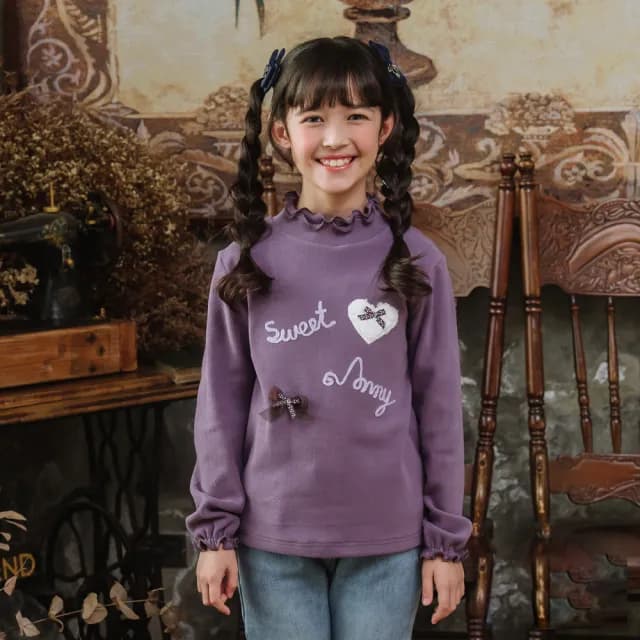 【ANNY’S 安妮公主】童裝 甜美荷葉邊造型愛心蝴蝶結秋冬款花瓣邊長袖上衣(3440紫色)