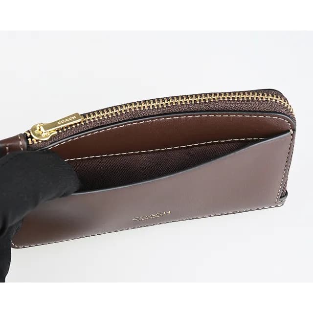 【COACH】COACH New York燙印金字LOGO小牛皮5卡拉鍊卡夾零錢包(楓木褐)