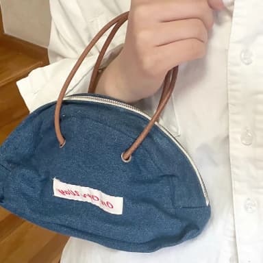 【牛仔女孩】INS復古牛仔半圓手提包(大容量 帆布 休閒包 收納包 化妝包 手拎包 禮物