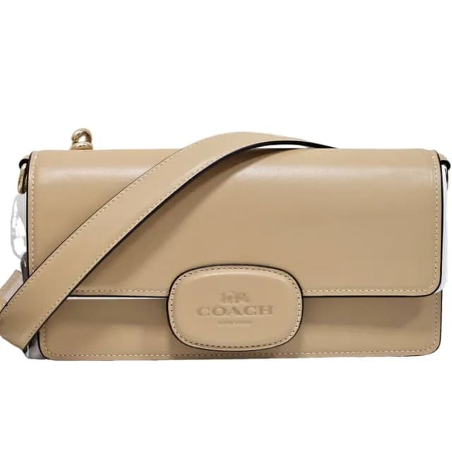 【COACH】ELIZA 素面全皮橢圓皮釦皮革翻蓋閉合設計斜背手袋(奶茶色/贈原廠防塵袋紙袋送禮)