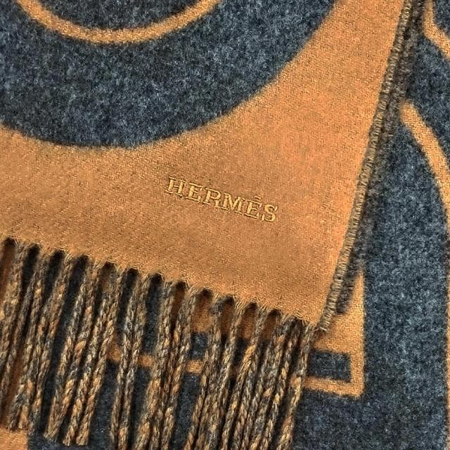 【Hermes 愛馬仕】H394825T 03 Maillons Tgm 經典羊毛雙面編織流蘇圍巾(棕黑色)