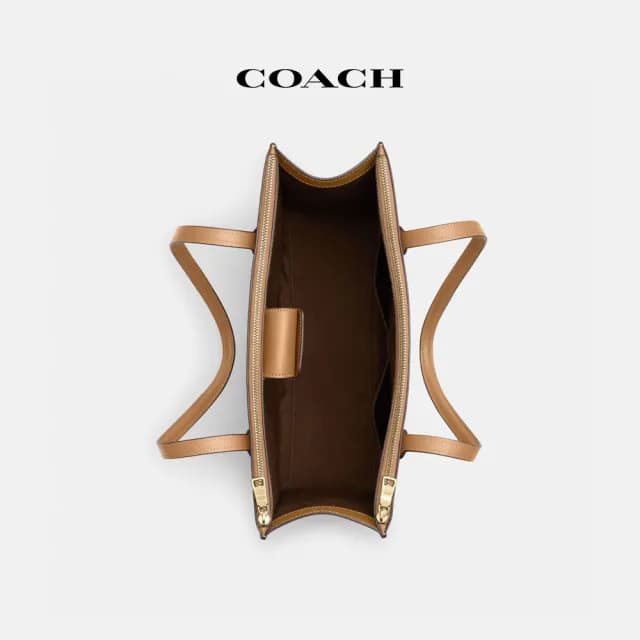 【COACH】蔻馳官方直營 NINACARRYALL經典Logo手袋-IM/淺卡其色/淺馬鞍棕色(CL399)