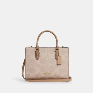 【COACH】蔻馳官方直營 MAGGIE撞色經典Logo小號托特手袋-IM/沙黃色/棕黃色(CY676)