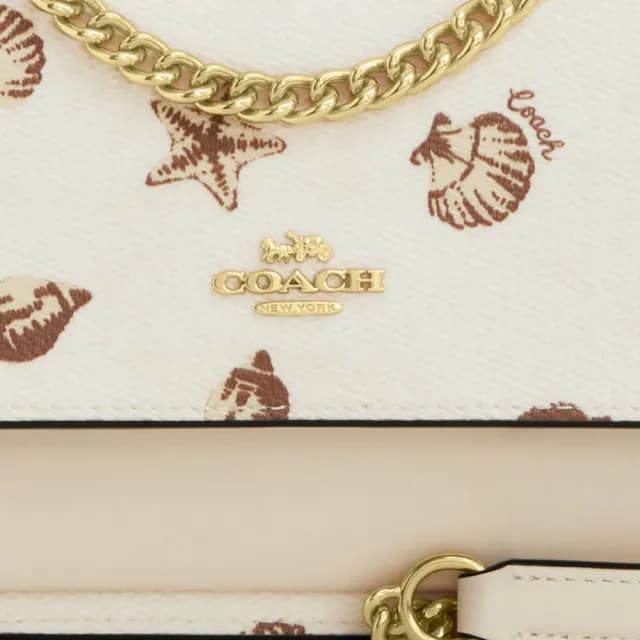 【COACH】蔻馳官方直營 KLARE貝殼印花迷你斜背手袋 斜背包 側背包 斜挎包-IM/粉筆白色 混合色(CBI18)