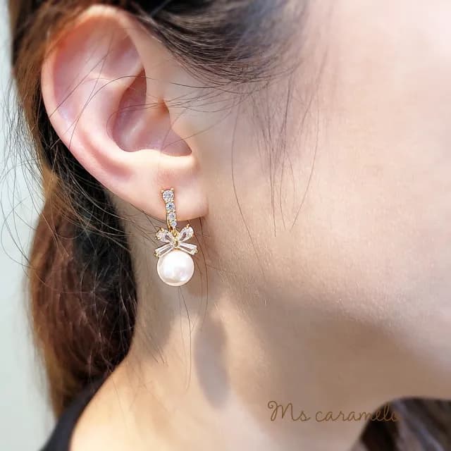【Ms caramelo 焦糖小姐】夾式耳環 貝珠蝴蝶結耳環(鋯石耳環)