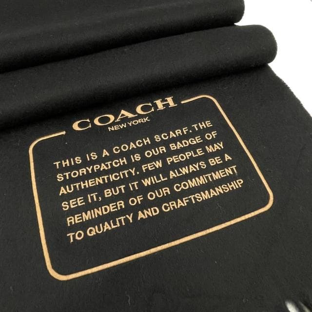 【COACH】新款素面字母LOGO雙面100%喀什米爾羊毛流蘇圍巾(黑)