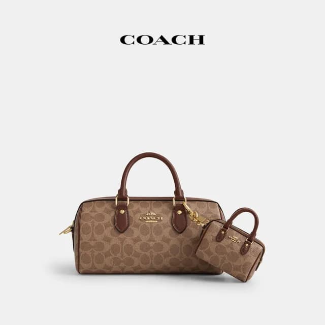 【COACH】蔻馳官方直營 ROWAN經典Logo迷你手袋掛件-IM/棕黃色/棕色(CX068)