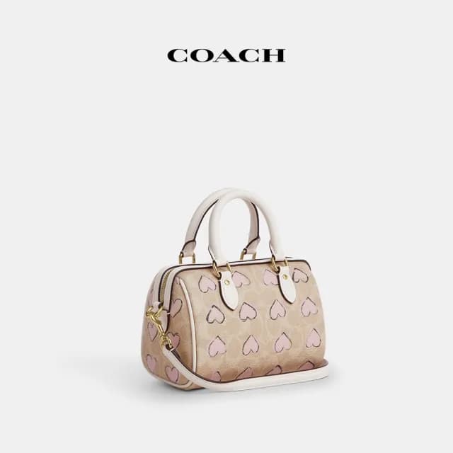 【COACH】蔻馳官方直營 ROWAN經典Logo愛心印花CITY迷你斜背手袋-IM/沙黃色 混合色(CBS69)