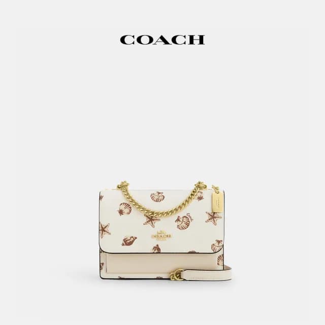 【COACH】蔻馳官方直營 KLARE貝殼印花迷你斜背手袋 斜背包 側背包 斜挎包-IM/粉筆白色 混合色(CBI18)
