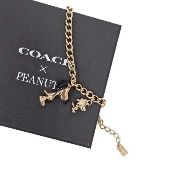 【COACH】COACH SNOOPYxPEANUTS史努比限量手鍊禮盒組(贈原廠紙袋贈送禮)