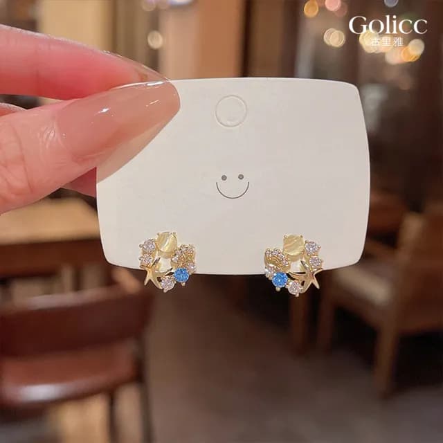 【Golicc】耳環 韓國 精緻 鋯石 貓眼石 花朵(七夕 情人節 生日 飾品 耳釘 耳飾 耳墜 禮物)