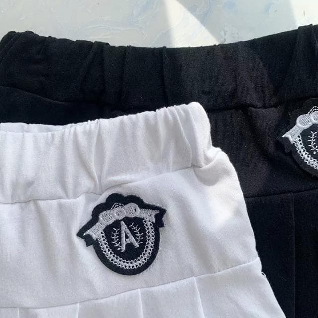 【橘魔法】學院風刺繡勳章棉質百褶裙(內有安全褲 褲裙 短裙 大童 女童 制服 兒童 童裝)