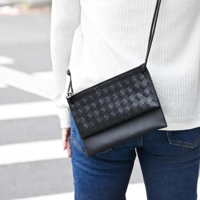【BOTTEGA VENETA 寶緹嘉】經典手工編織小牛皮雙袋方包斜背包(黑咖)