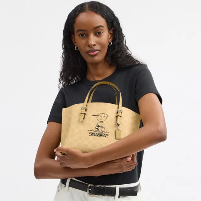 【COACH】蔻馳官方直營 COACH X PEANUTS MOLLIE 經典LogoCHARLIE BROWN圖案25號托特手袋(CBM29)