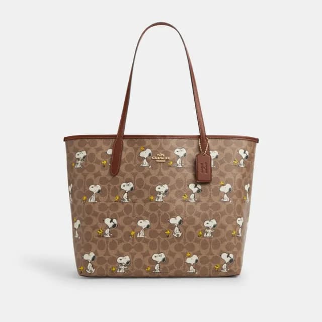 【COACH】蔻馳官方直營 COACH X PEANUTS CITY經典Logo SNOOPY印花托特手袋-IM/棕黃色/棕色 混合色(CBJ89)