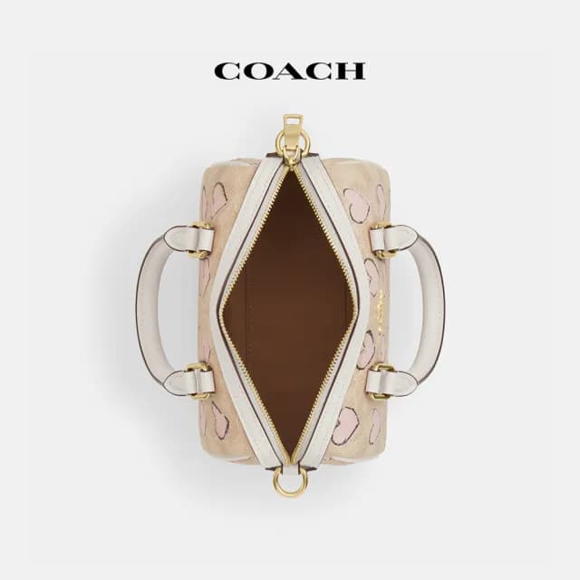 【COACH】蔻馳官方直營 ROWAN經典Logo愛心印花CITY迷你斜背手袋-IM/沙黃色 混合色(CBS69)
