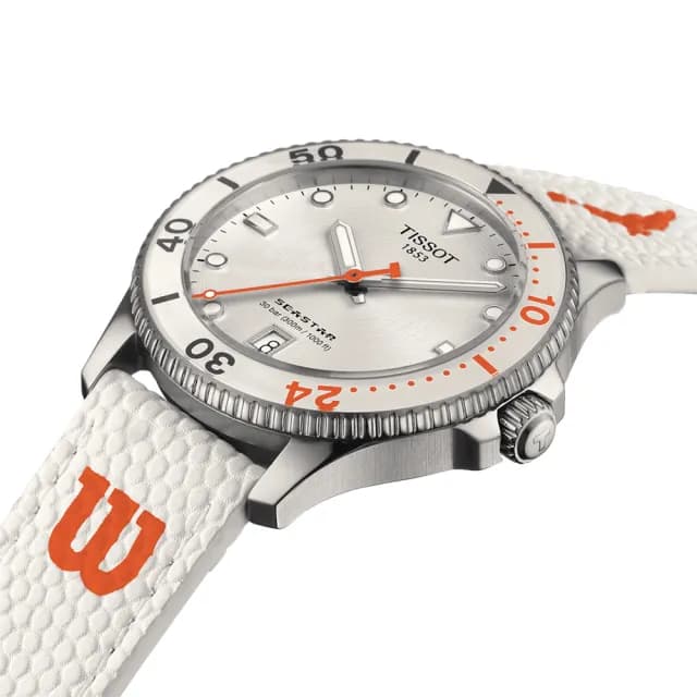 【TISSOT 天梭】Seastar Wilson WNBA 石英手錶-40mm 加贈橘色錶帶 禮物(T1204101701100)