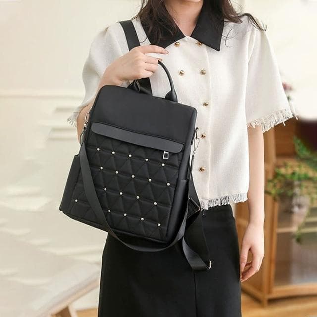 【MoonDy】包包 後背包 尼龍包包 防潑水後背包 鉚釘包包 防盜背包 黑色包包 前背背包 防盜背包 旅行背包 送女生 小禮物