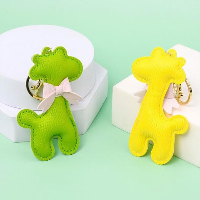 【LEESA】手機吊飾\情侶吊飾\蝴蝶結\皮革\長頸鹿\鑰匙防丟\隨身\背包扣環\造型鑰匙圈\手工藝品\禮物鑰匙扣\汽車鑰匙扣