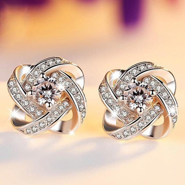 【MoonDy】耳環 耳釘 S925純銀 四葉草 六爪雪花旋轉 飾品女 耳飾