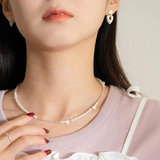 【Queenshop】QUEENSHOP_ S 女裝 正韓 鏤空愛心吊墜耳針式耳環 現+預 07030933